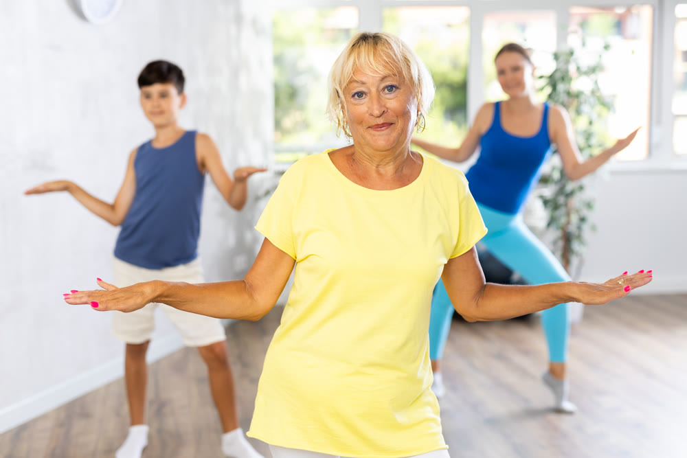 Group of people in gym incendiary dance doing fitness