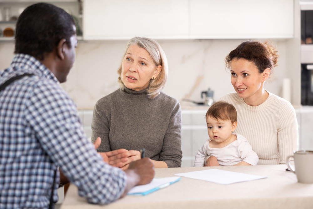 Male agent offers good insurance conditions for family of different generation
