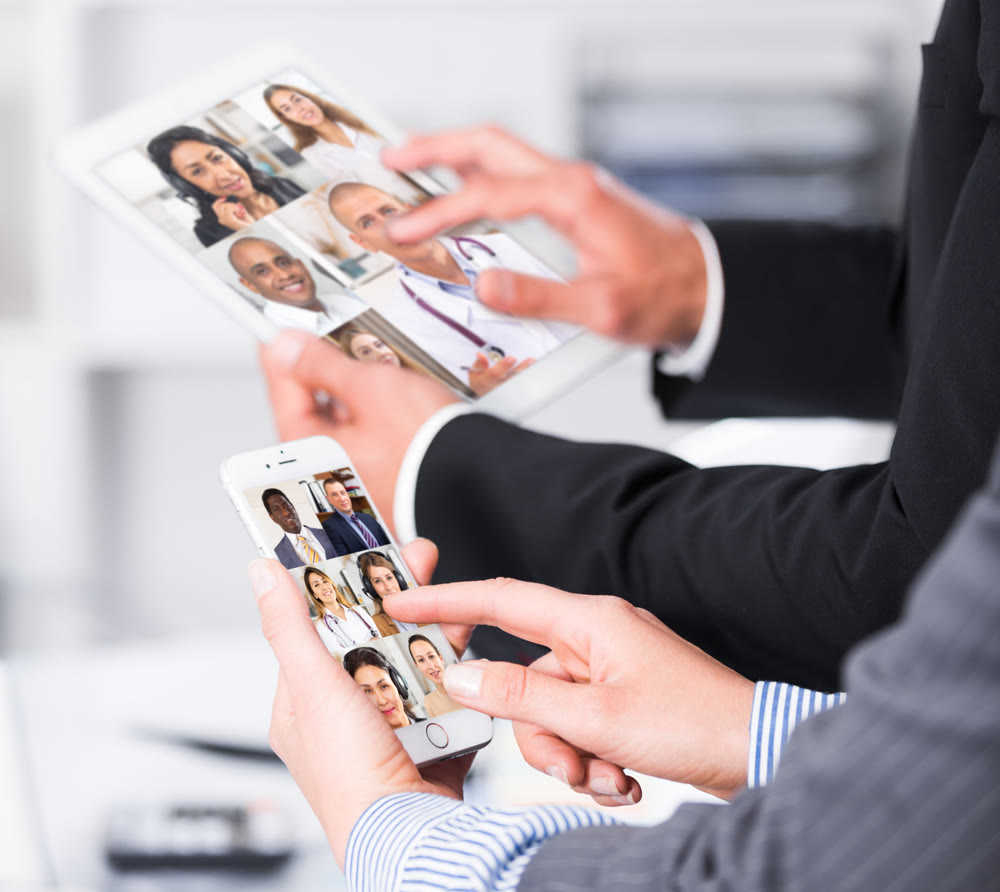 Video conference on smartphone or tablet, business meeting. Communication with business colleagues via video conference closeup