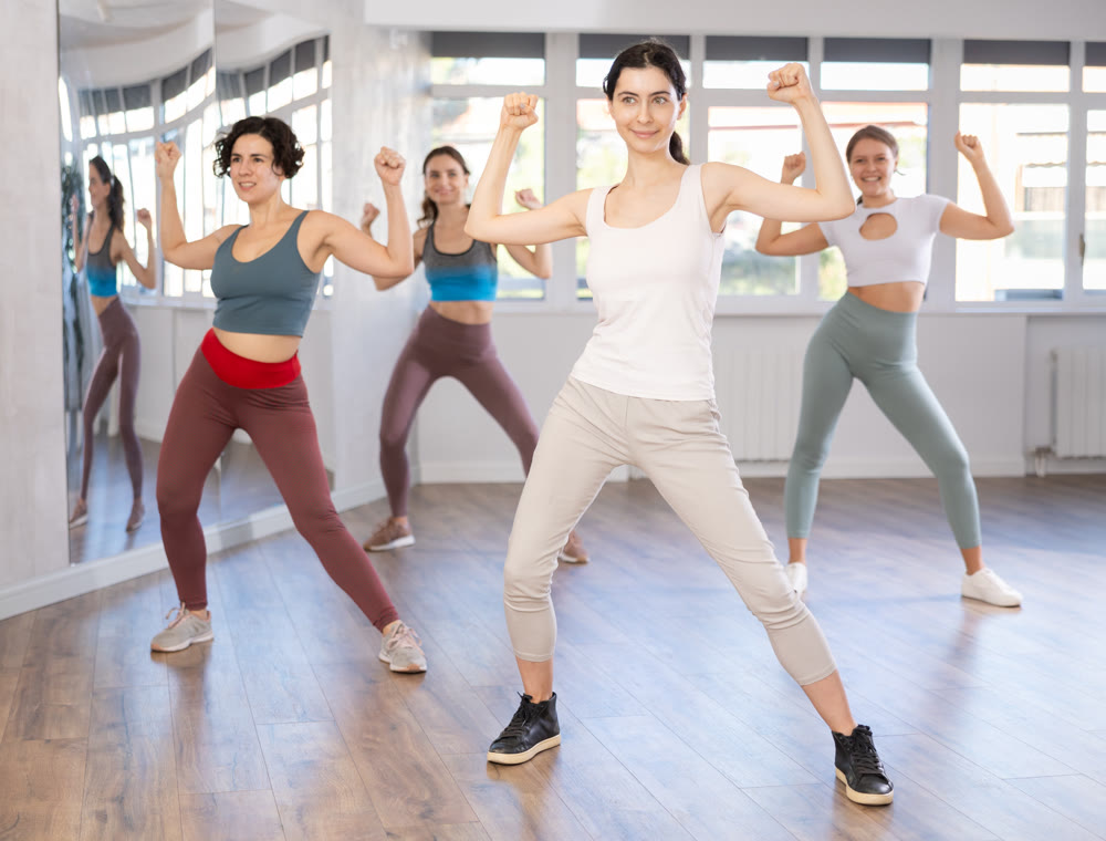 Group of women dancing dancehall in studio