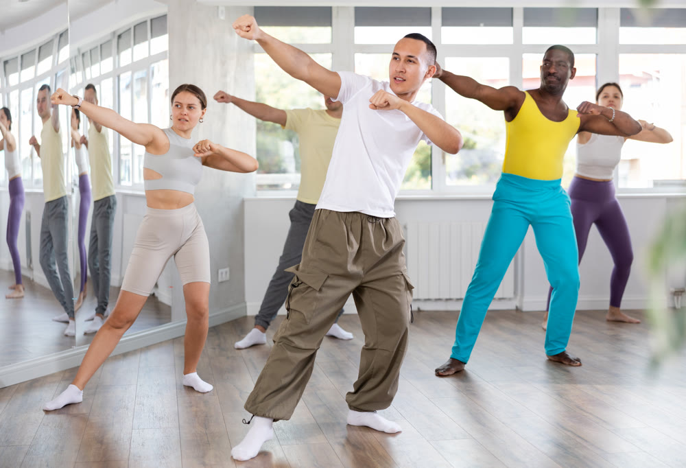 Group of people dancing modern dances