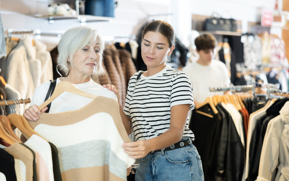 Ladies carefully select sweaters