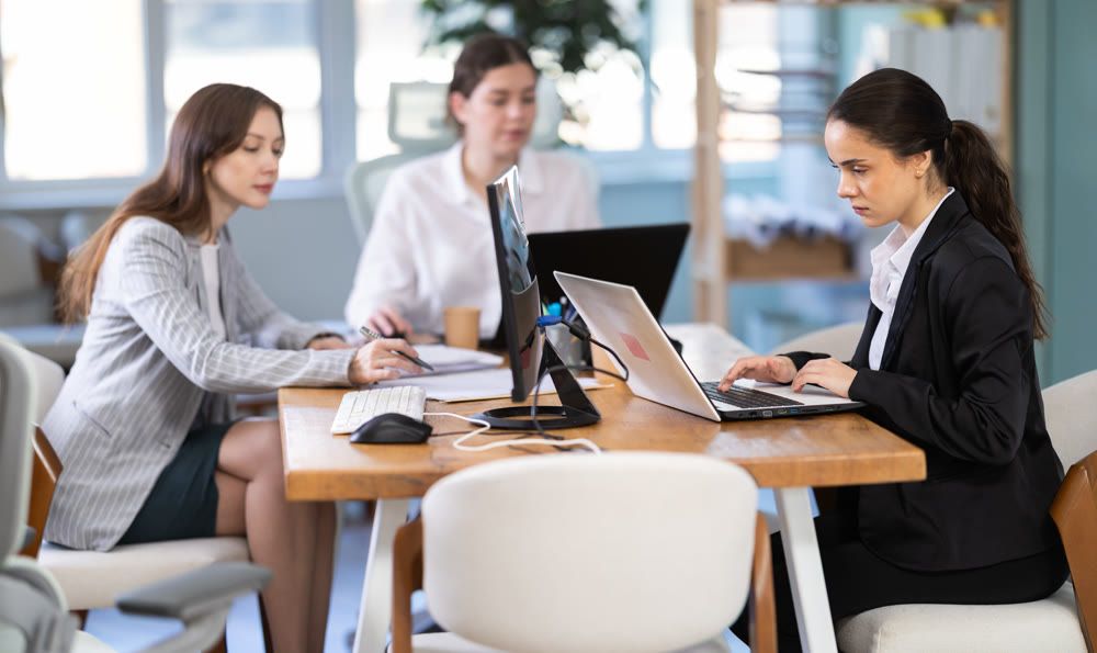 group of employees working in an office