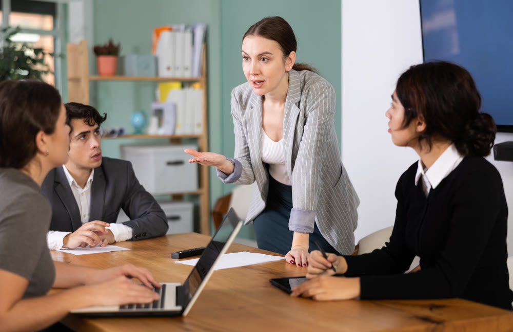 Woman lawyer leads the discussion at a meeting