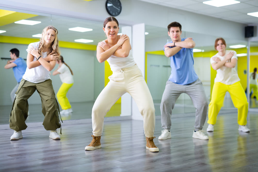 Young girl dancing modern dance in studio