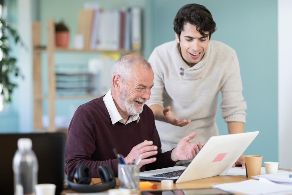 Men office employees is genuinely happy and elated