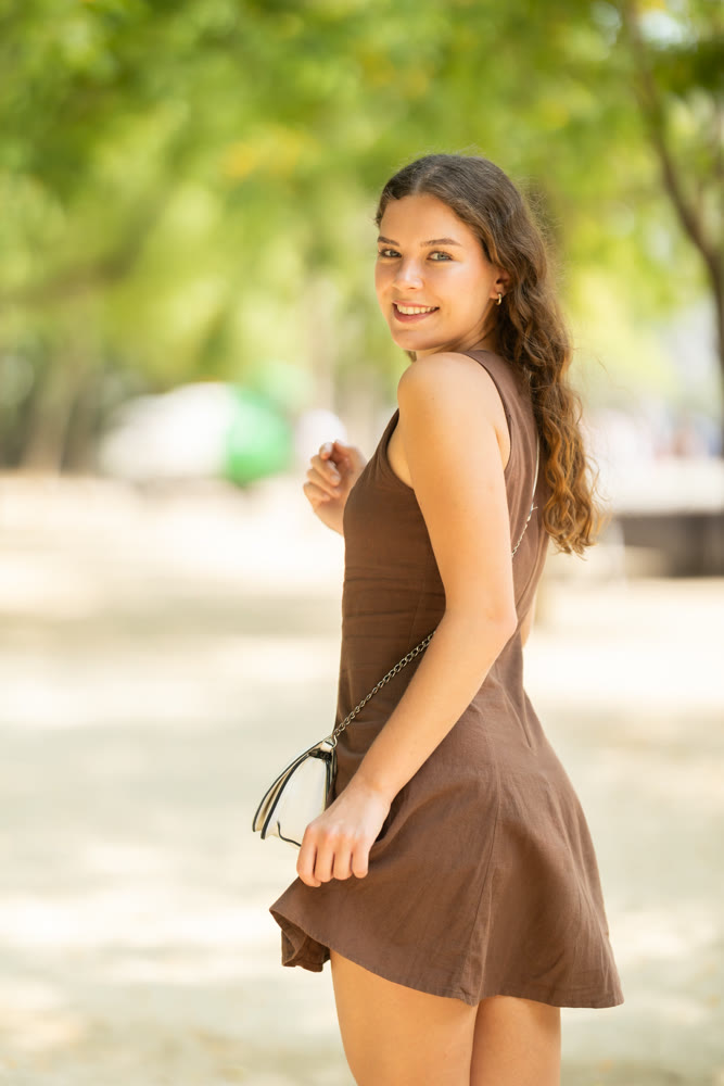 Woman walking in the park in summer