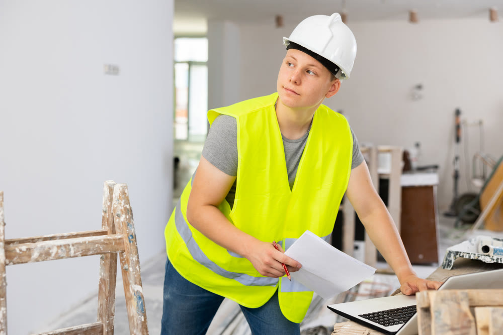 Young man working in construction site