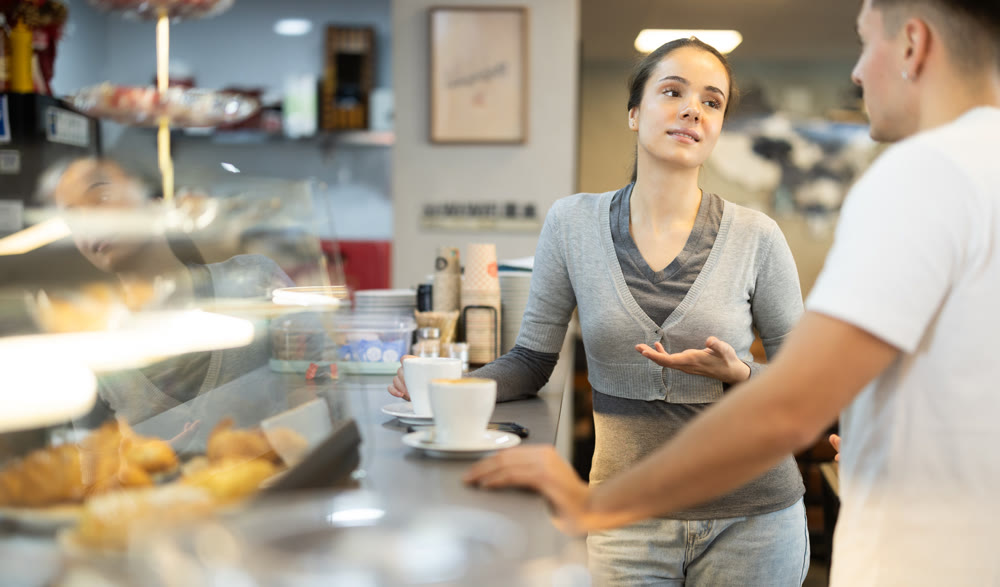Couple is having nice conversation at bar