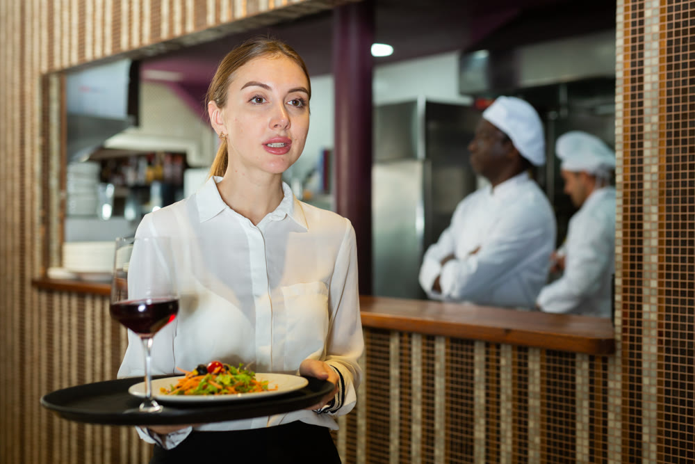 Portrait of waitress ready to serving meals