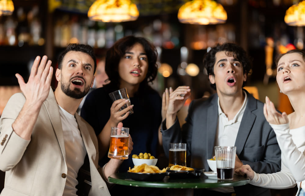 Sports fans react with disappointment to changes in bad luck game