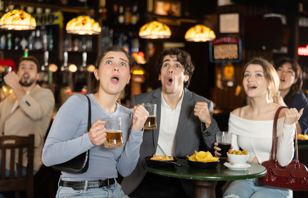 Sports fans react with delight to changes in lucky game