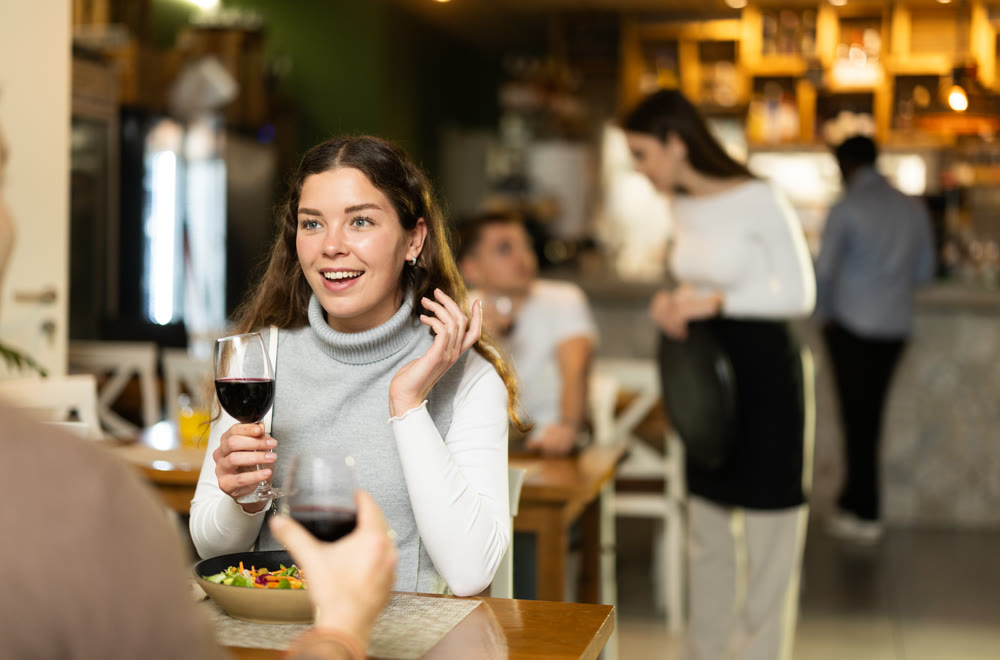 Woman talking to her husband in a restaurant