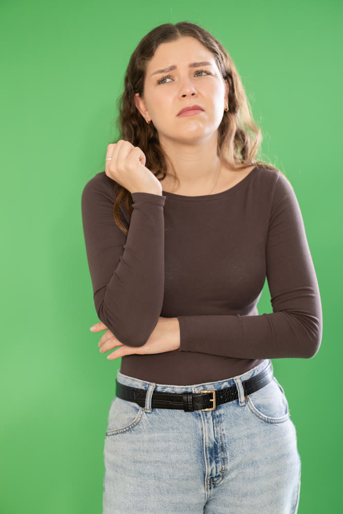 Sad girl is upset about problems that have arisen. Chroma key compositing