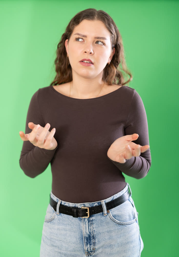 Discouraged or puzzled female person is trying to recall necessary information