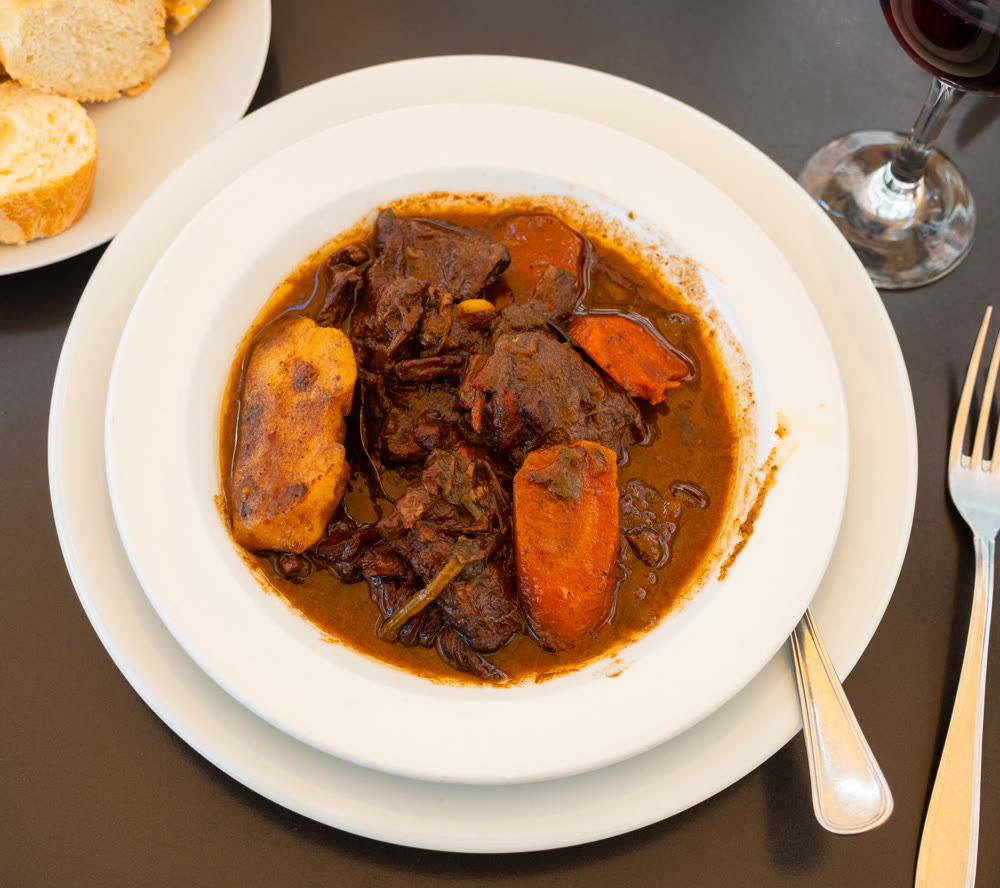 Fricando de ternera - this is traditional Catalan dish consisting of meat stewed in rich sauce with mushrooms