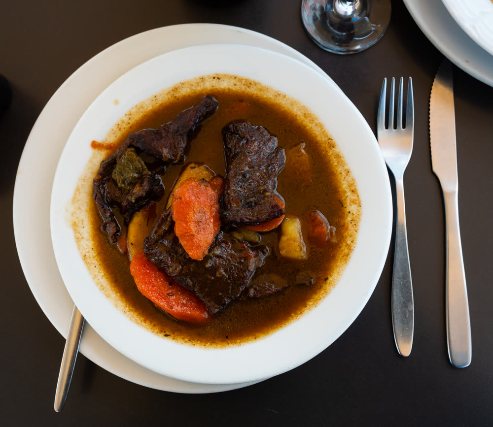 Fricando de ternera - this is traditional Catalan dish consisting of meat stewed in rich sauce with mushrooms