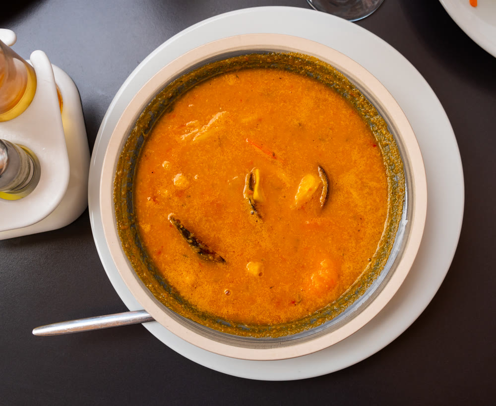 Spicy Mediterranean soup made with seafood and thin noodles.