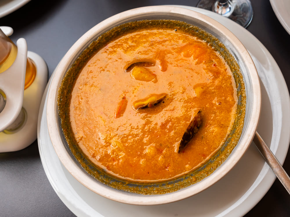 Spicy Mediterranean soup made with seafood and thin noodles.