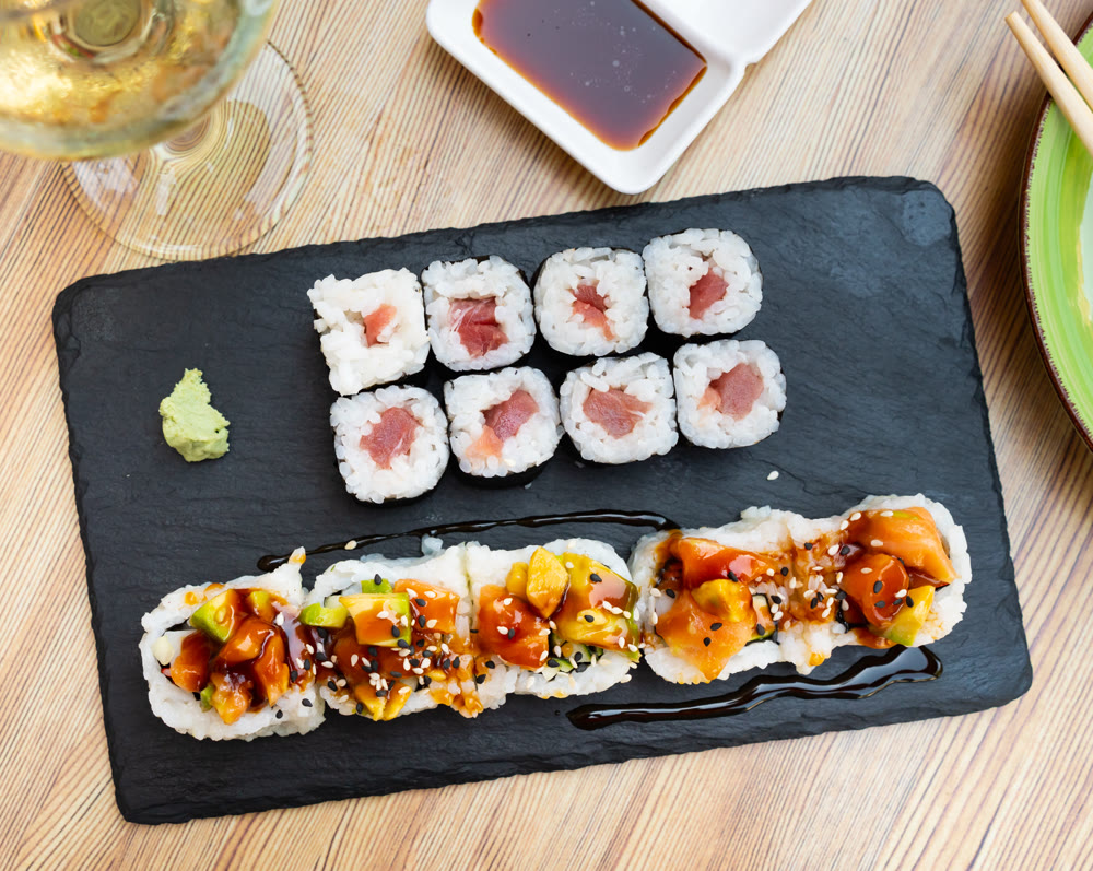 Sushi set with salmon and tuna maki and uramaki