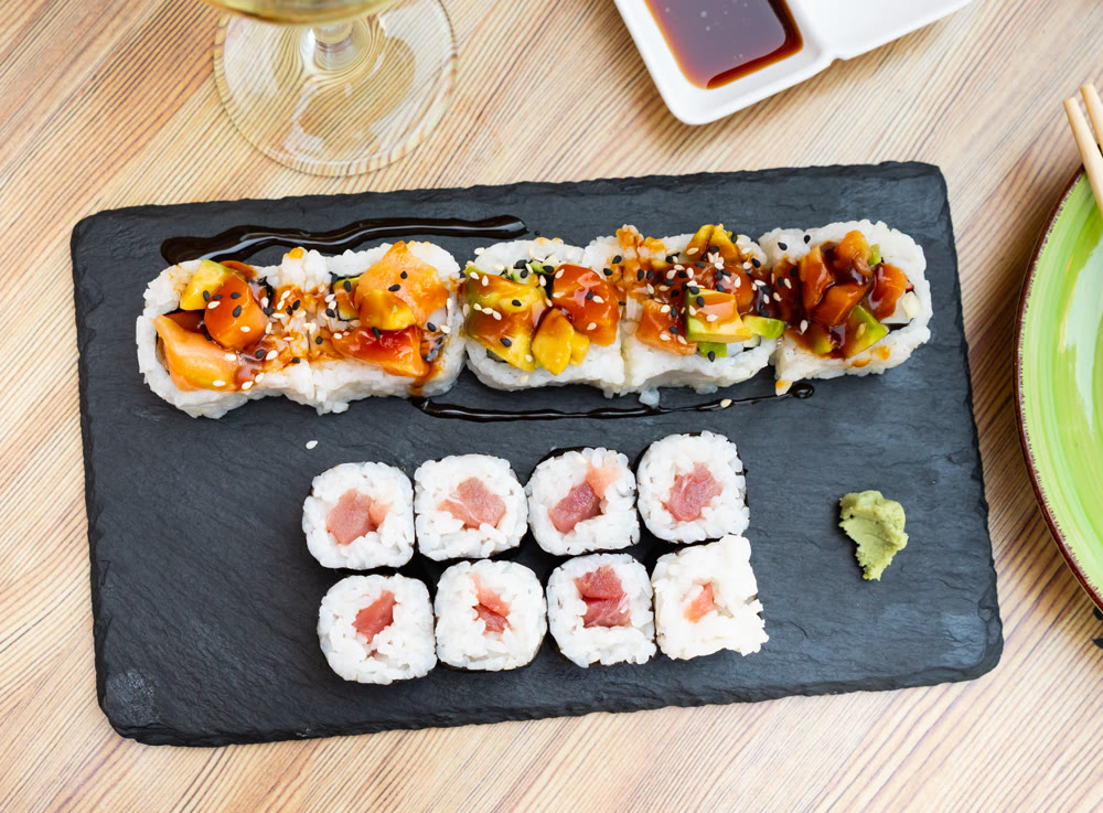 Sushi set with salmon and tuna maki and uramaki