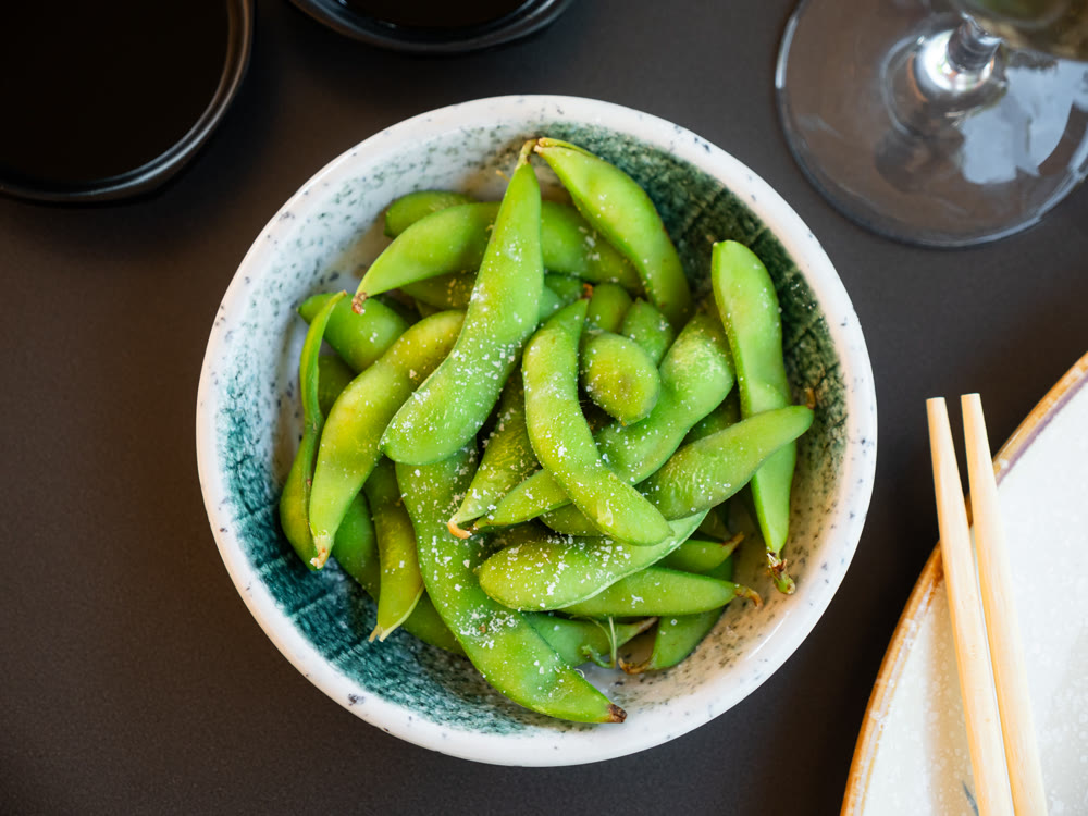 Edamame green soybeans served in bowl