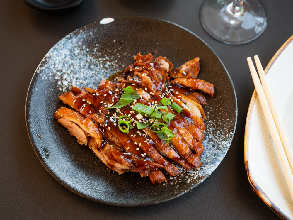 Chinese fried duck with sauce top view