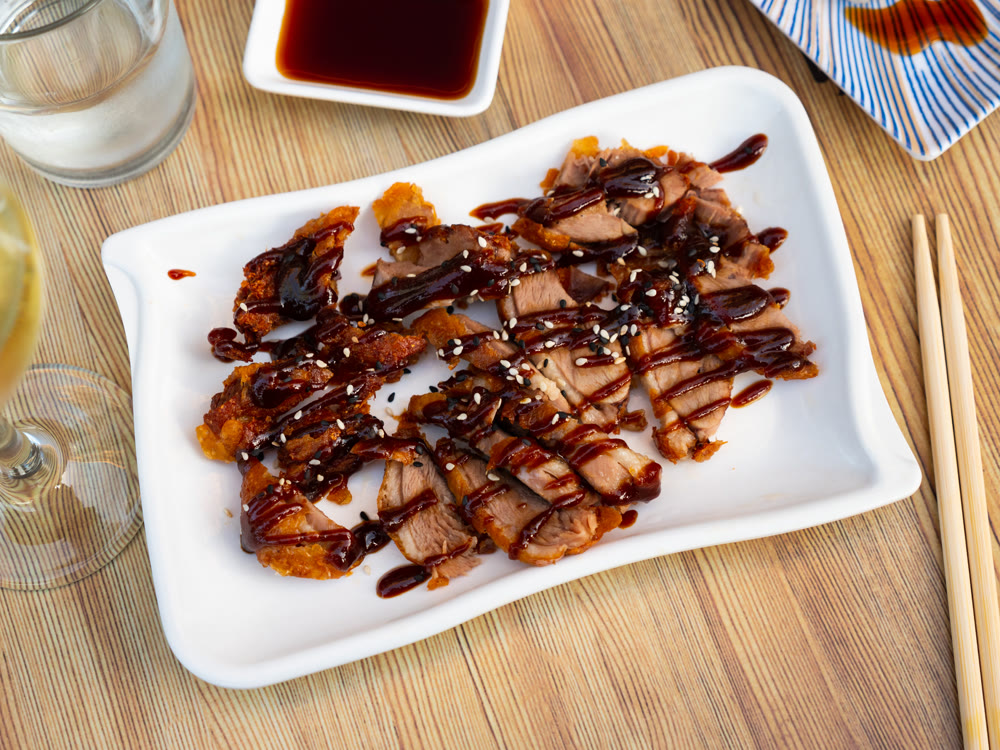 Pato frito Japanese style duck. Delicious spicy sesame duck dish asian cuisine gourmet food