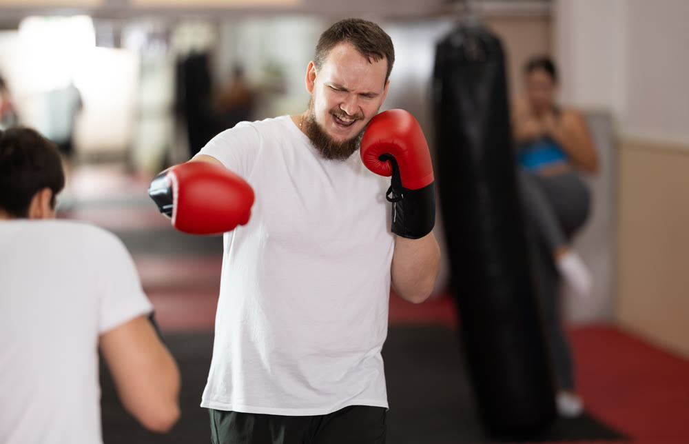 Man in boxing gloves sparring