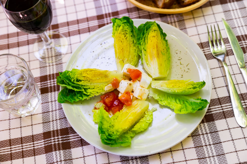 Typical Spanish appetizer of lettuce hearts with cheese and tomatoes, widely used in Mediterranean diet