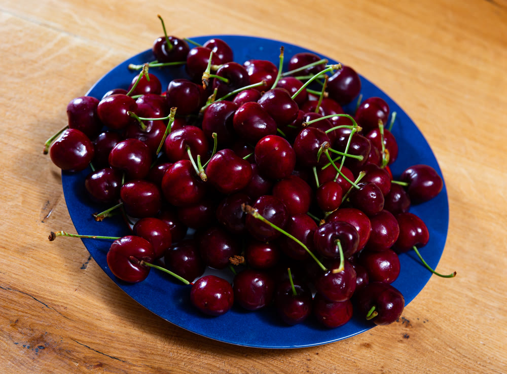 Juicy sweet cherry berry served on plate
