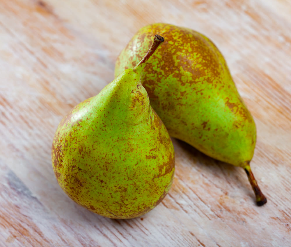 Pears on wooden table