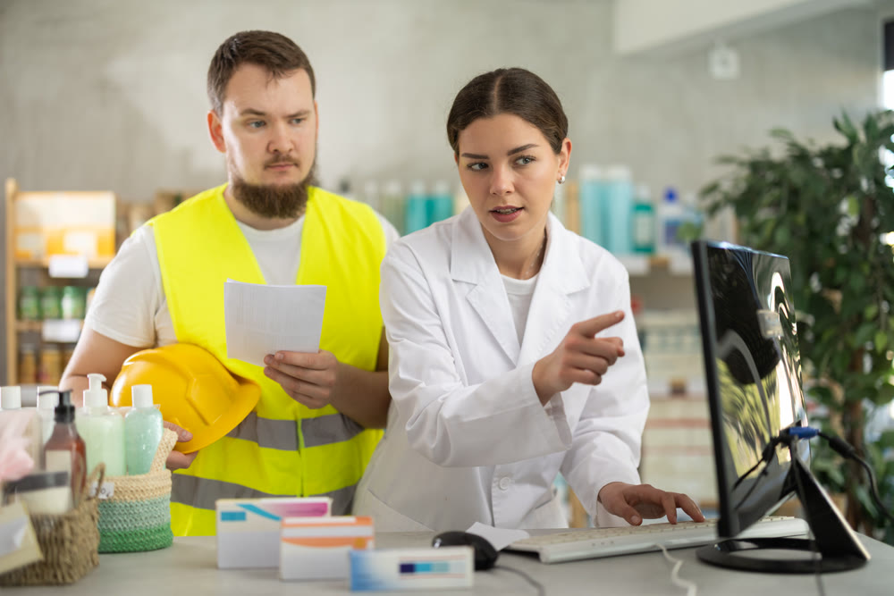 Builder client came to girl pharmacist with medical prescription