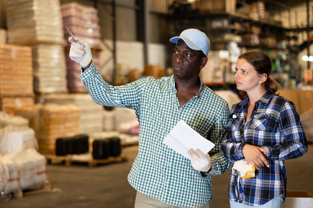Man and woman choosing building materials