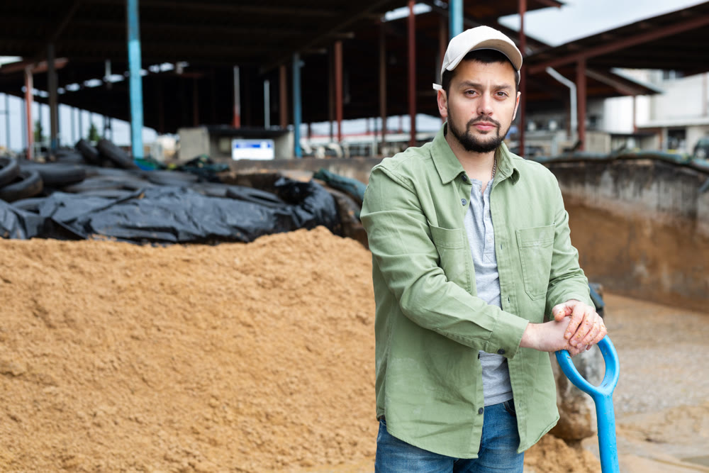 Portrait of man farmer with shovel