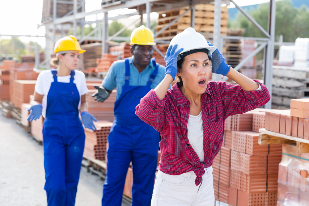 Portrait of surprised employees working in a warehouse