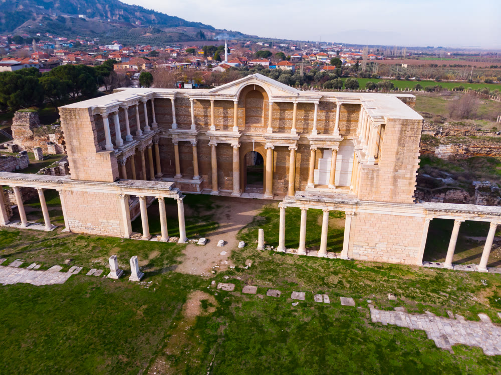 View from drone of bath-gymnasium complex ruins in Sardis, Turkey