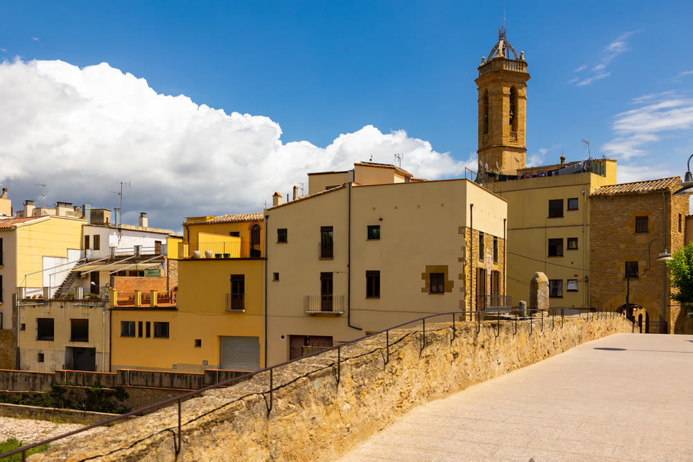 La Bisbal d'Emporda from Castilla. Imposing Romanesque construction, nearby church of Santa Maria de Bisbal.