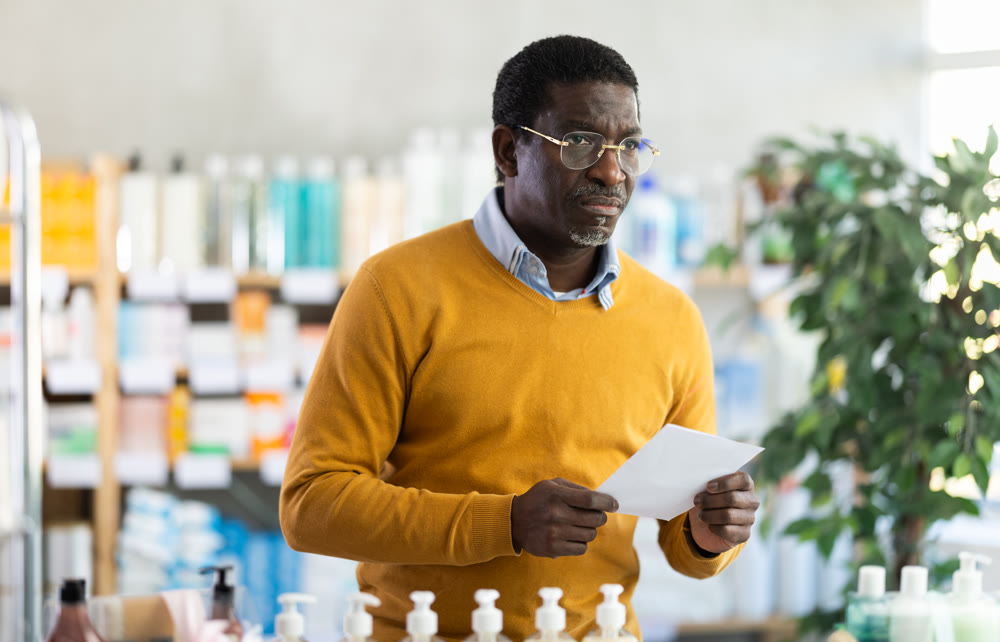 Adult man chooses prescription medications