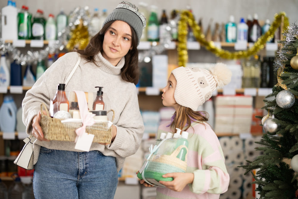 woman chooses gifts with her daughter