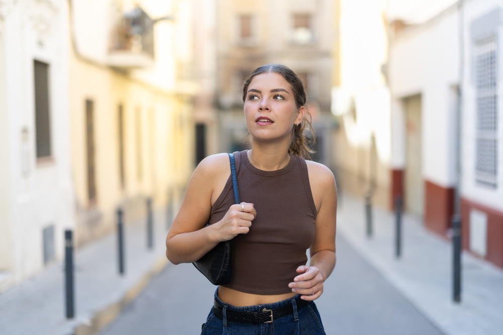 Girl walks around city district