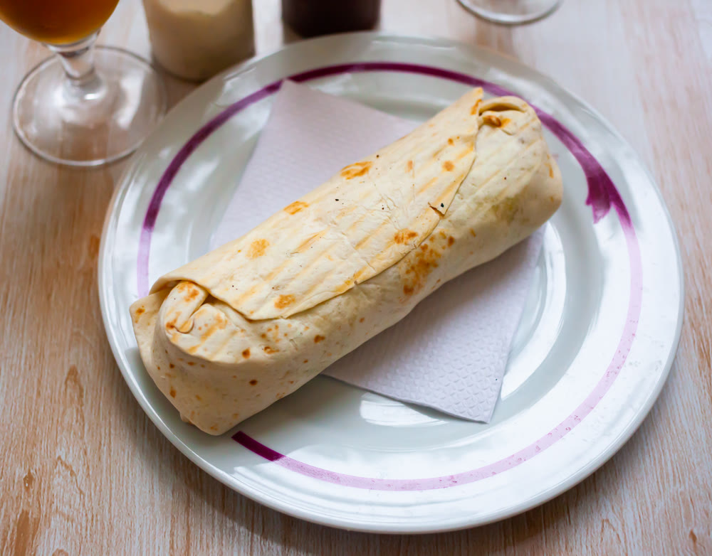 Shawarma with chopped vegetables and greens