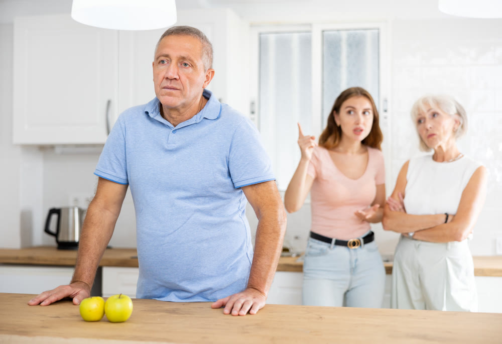 Portrait of unhappy mature father