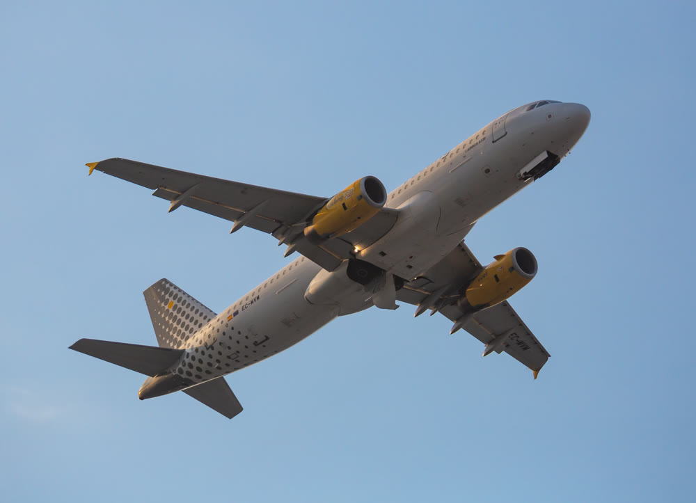 Vueling airbus EC-MVM soaring from El Prat Airport