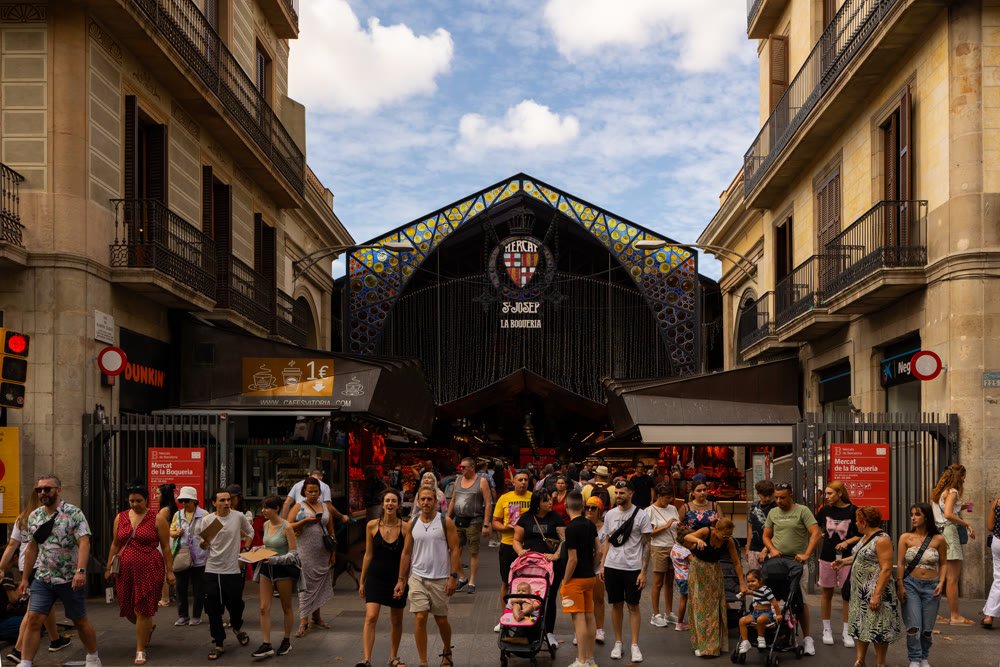 Barcelona, Spain - September 01, 2023: Main gate at La Boqueria market in Barcelona. Market has been known since 1217. Now - one of city's foremost tourist landmarks