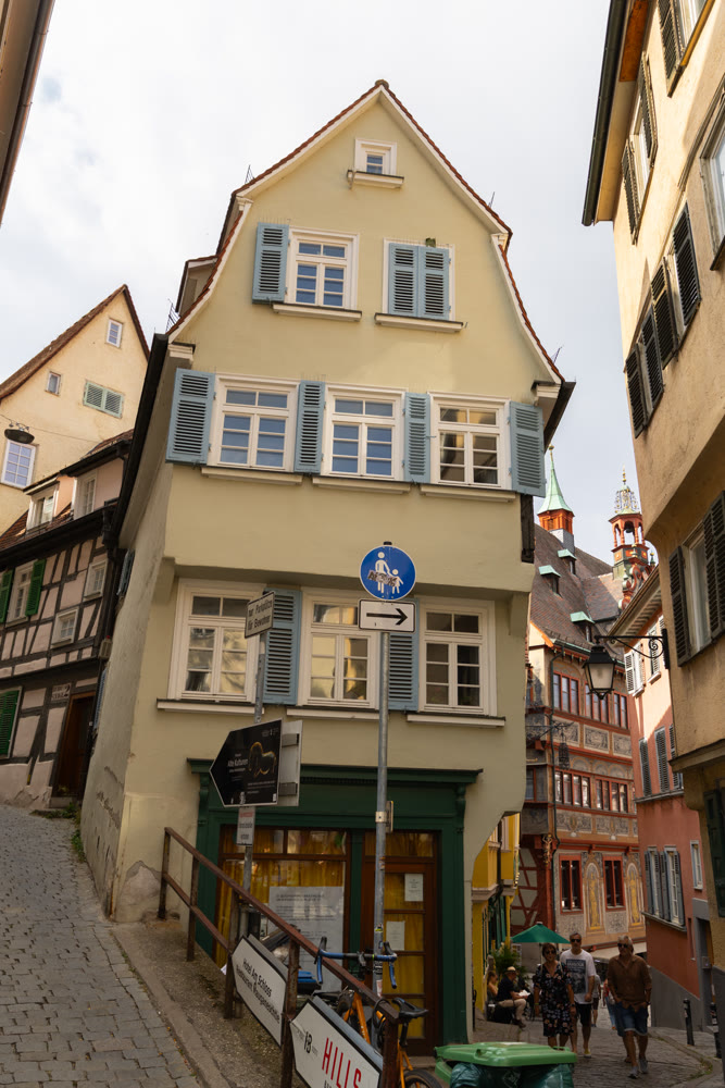 Street with traditional timber-framed houses in old town of Tubingen
