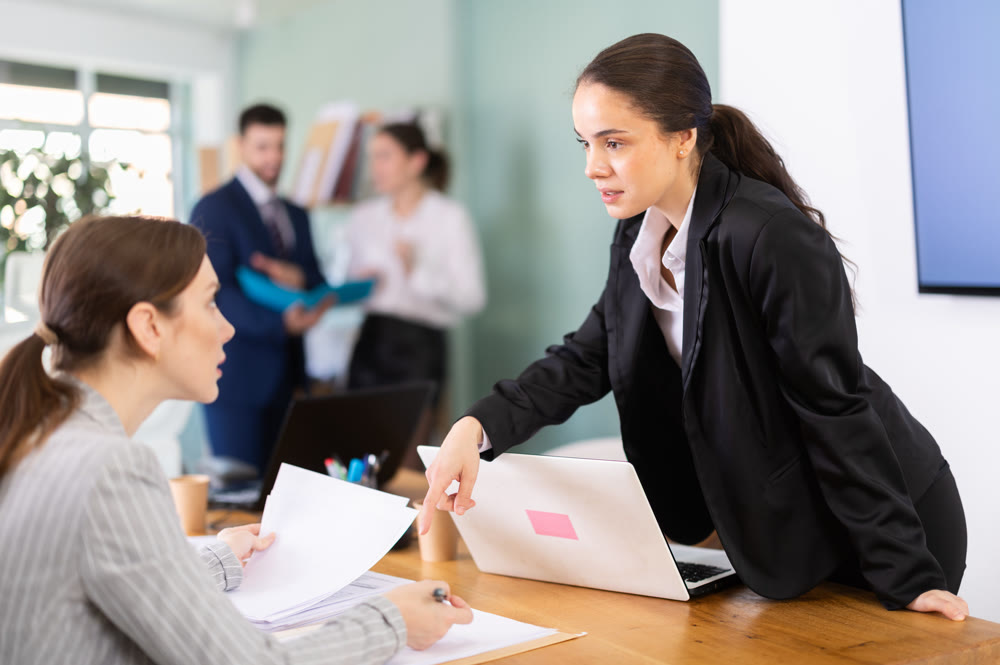 group of employees working in an office