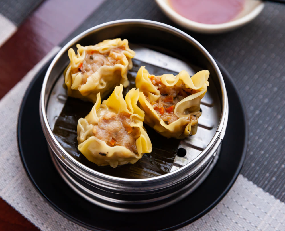Japanese tasty dumplings siumai in steamer, nobody