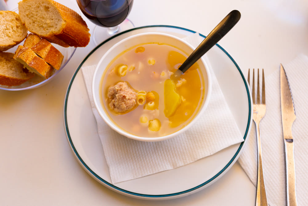 Catalan Christmas soup with meatballs, pasta and vegetables