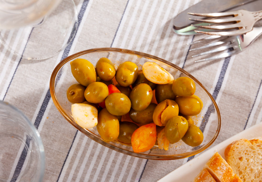 Green olives with garlic and onions